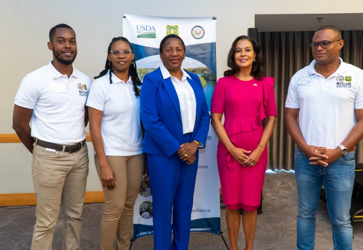 Minister of Planning and Development in Trinidad and Tobago, Hon. Pennelope Beckles-Robinson (centre), shares a photo opportunity with (from left), Executive Director, Jamaica Conservation and Development Trust (JCDT), David Walters;  Natural Infrastructure for Caribbean Resilience (NICaR) Programme Manager, Shelly-Ann Lawson Francis; United States Ambassador to Trinidad and Tobago, Candace Bond; and Executive Director, Central Jamaica Social Development Initiative, Damion Young. Occasion was an ecosystem restoration training held recently in Trinidad and Tobago.