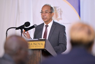 Minister of National Security, Hon. Dr. Horace Chang, addresses the International Social Care Services Social Work Conference on Tuesday (March 19) at the Terra Nova All-Suite Hotel, St. Andrew.
