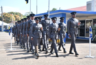 Newly minted correctional officers perform a march-past at the Department of Correctional Services (DCS) closing out ceremony, which was held at the Carl Rattray Staff College in Runaway Bay, St. Ann, on Friday ( March 15).

