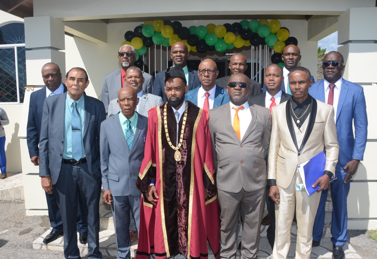 Newly installed Mayor of Black River and Chairman of the St. Elizabeth Municipal Corporation, Councillor Richard Solomon (centre), is joined by his fellow Councillors during a swearing-in ceremony on Thursday (March 7) at the Corporation in Black River.