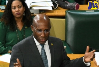 Minister of Industry, Investment and Commerce, Senator the Hon. Aubyn Hill, piloting the Appropriations Bill, 2024 in the Senate on March 27.