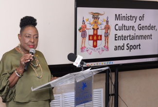 Minister of Culture, Gender, Entertainment and Sport, Hon. Olivia Grange, addresses members of the Independent Anti-Doping Disciplinary Panel and the Anti-Doping Tribunal, at the Jamaica Pegasus Hotel in New Kingston on Thursday (March 21).

