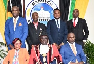 Newly installed Councillors of the Hanover Municipal Corporation (HMC), headed by Chairman and Mayor of Lucea, Councillor Sheridan Samuels of the Caudwell Division (seated, centre)  following their swearing-in ceremony on Thursday (March 7).  Mayor Samuels is flanked by Vice Chairman of the Corporation and Deputy Mayor, Councillor Andria Dehaney-Grant of the Sandy Bay Division (left), and Councillor for the Riverside Division, Daren Barnes.  Other Councillors are (from left) Marvell Sewell of the Green Island Division; Wynter McIntosh of the Chester Castle Division; Lennox Fray of the Hopewell Division and Brian Chambers of the Lucea Division.

