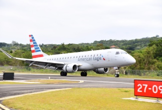 American Airlines flight # 007 arrives at the Ian Fleming International Airport from Miami, Florida, just after midday on Saturday, February 24. The inaugural flight by the largest airline in the world into Jamaica’s smallest international airport marked the beginning of the airlines twice-weekly service into the St. Mary airport.

