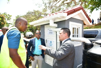 Minister without Portfolio in the Ministry of Economic Growth and Job Creation, Senator the Hon. Matthew Samuda (right), shares in conversation with (from left) General Construction Instructor, Beechamville Vocational Training Centre, Daniel Rose and Minister of State in the Ministry of Labour and Social Security, Dr. the Hon. Norman Dunn, at the World Water Day Expo held at the Marymount High School, St. Mary, on March 22.

