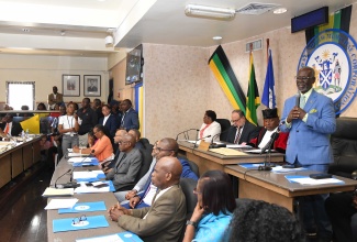 Minister of Local Government and Community Development, Hon. Desmond McKenzie, delivers remarks at the ceremony for the swearing in of Councillors of the Kingston and St. Andrew Municipal Corporation (KSAMC) held on March 12 at the Corporation on Church Street in downtown Kingston.

