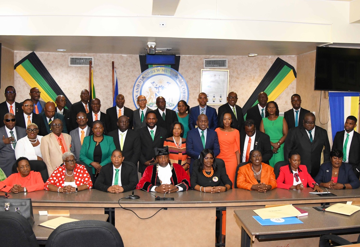 Newly installed Mayor of Kingston, Councillor Andrew Swaby (fifth left), and Deputy Mayor, Senator Councillor Delroy Williams (fourth left), with Councillors representing Divisions across the Kingston and St. Andrew Municipal Corporation (KSAMC). The occasion was Tuesday’s (March 12) Statutory Meeting for the Declaration of KSAMC Councillors and selection of the Mayor and Deputy Mayor of Kingston at the Corporation’s offices on Church Street in downtown Kingston.