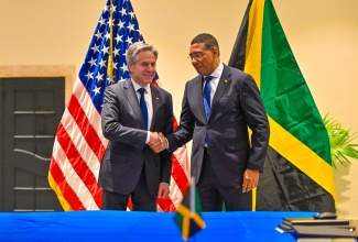 Prime Minister, the Most Hon. Andrew Holness (right), greets United States Secretary of State, Antony Blinken, before the start of a Bilateral meeting at The Jamaica Pegasus Hotel in New Kingston on Monday (March 11).


