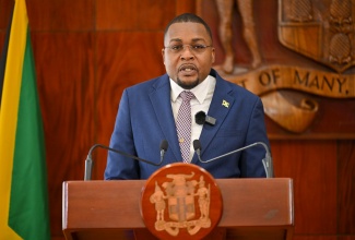 Minister without Portfolio in the Office of the Prime Minister with responsibility for Information, Hon. Robert Morgan, addresses Wednesday’s (March 13) post-Cabinet press briefing at Jamaica House.

