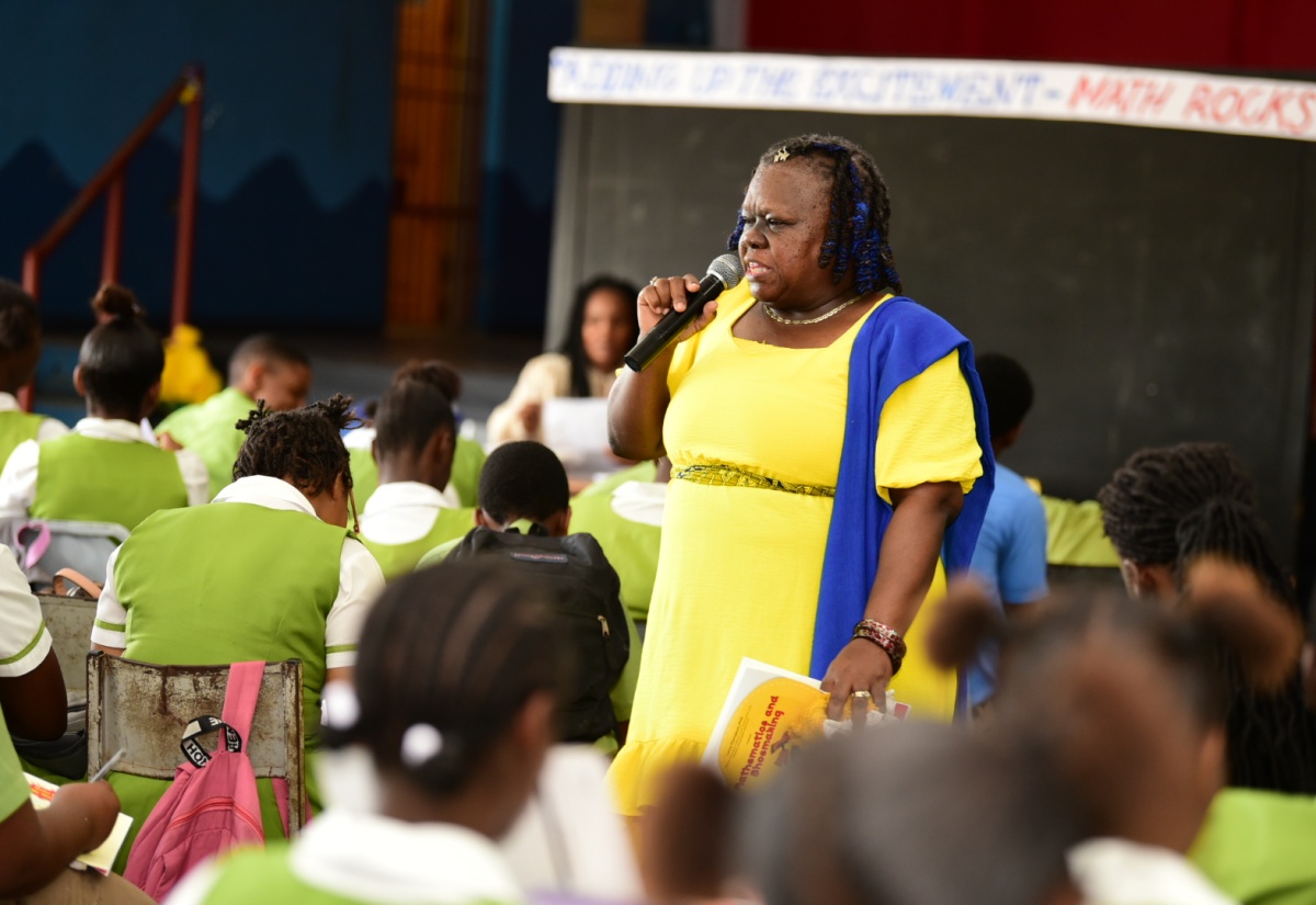 Senior Education Officer, Core Curriculum Unit, Ministry of Education and Youth, Dr. Lorna Thompson, addresses the Norman Manley High School Maths Conference held at the institution in Kingston on Friday (April 19). The event was part of activities for Maths Week from April 14 to 19 under the theme 