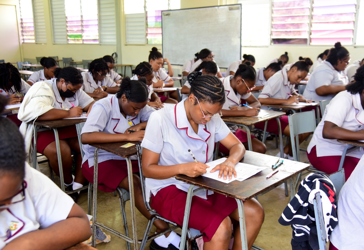 Grades 12 and 13 students at St. Andrew High School for Girls sit the road code test, which was administered by the Island Traffic Authority (ITA) at the school’s Cecelio Avenue address in St. Andrew on Tuesday (April 23).
