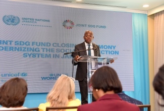 Minister of Labour and Social Security, Hon. Pearnel Charles Jr., addresses Wednesday’s (April 24) United Nations Joint Sustainable Development Goals (SDG) Fund Closing Ceremony, held at the Courtyard by Marriott Hotel in Kingston. 