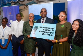 Minister of Education and Youth, Hon. Fayval Williams (third left), and Minister of State in the Ministry of Finance and the Public Service, Hon. Zavia Mayne (third right), share a photo opportunity with participants during Tuesday’s (April 9) launch of the 2024 National Budget Secondary School Tour at St. Catherine High School. Sharing the moment (from left) are a student of St. Catherine School and Principal, Marlon Campbell; Principal of St. Jago High School, Collette Feurtado-Pryce; and student. The tour is an initiative of the Finance Ministry.

