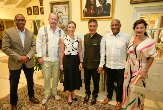 Minister of Foreign Affairs and Foreign Trade, Senator the Hon. Kamina Johnson Smith (third left), and Senator the Hon.  Aubyn Hill (second right), share a moment with High Commissioner of India to Jamaica, His Excellency Masakui Rungsung (third right), at a farewell dinner for the High Commissioner held in Cherry Gardens, St. Andrew on Thursday (April 25). Also in attendance (from left) are:  Jason Smith, the husband of Senator Johnson Smith; President of the Upper House, Senator Tom Tavares Finson and his wife, Rose Tavares Finson.

