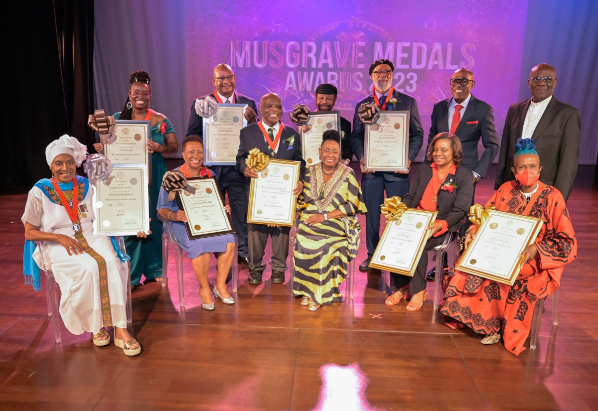 Minister of Culture, Gender, Entertainment and Sport, Hon. Olivia Grange (seated centre), joins the Musgrave Medal Award recipients at the recent awards ceremony held at the Philip Sherlock Centre for the Creative Arts, University of the West Indies (UWI) Mona, St. Andrew.