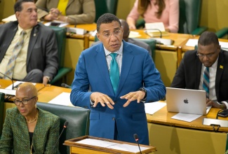 Prime Minister, the Most Hon. Andrew Holness, addresses the House of Representatives on Tuesday (April 9).
