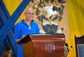 Minister of Education and Youth, Hon. Fayval Williams, addresses the University of Technology (Utech) installation ceremony for its fifth President, Dr. Kevin Brown, and fifth Pro-Chancellor, Aldrick McNab, at the Alfred Sangster Auditorium on the UTech campus in Papine, St. Andrew, on Thursday (April 11).

