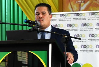 Minister Without Portfolio in the Ministry of Economic Growth and Job Creation, Senator the Hon. Matthew Samuda, addresses Excelsior High School’s ‘World Earth Day’ observance on April 22 at the school’s Mountain View location in Kingston.

