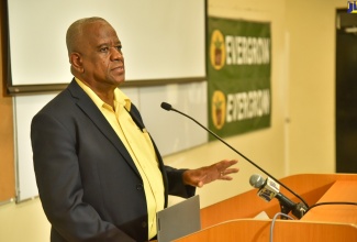 Minister of State in the Ministry of Agriculture, Fisheries and Mining, Hon. Franklin Witter.

