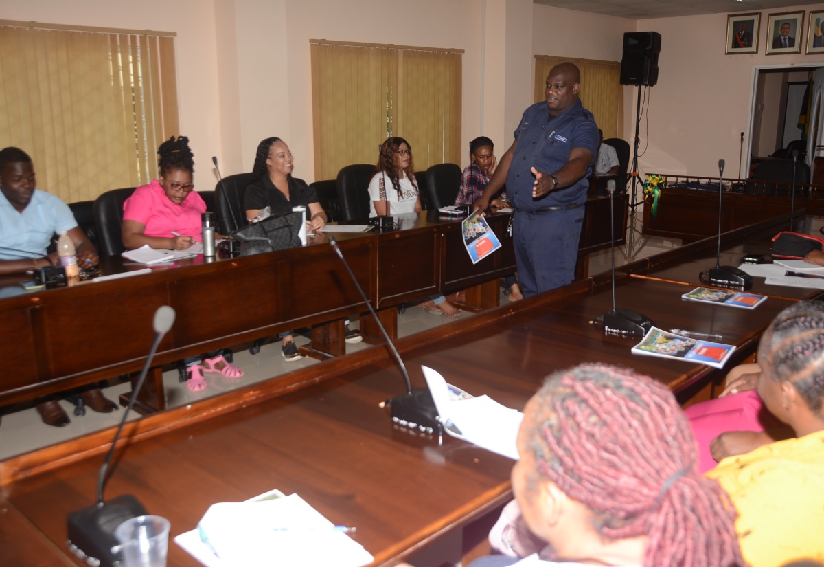 Corporal assigned to the Jamaica Fire Brigade (JFB) Fire Safety Prevention and Investigation Branch in St. Elizabeth, Dwight Campbell, interacts with staff of the St. Elizabeth Municipal Corporation and St. Elizabeth Infirmary during fire/safety monitor training recently.
