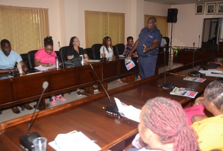 Corporal assigned to the Jamaica Fire Brigade (JFB) Fire Safety Prevention and Investigation Branch in St. Elizabeth, Dwight Campbell, interacts with staff of the St. Elizabeth Municipal Corporation and St. Elizabeth Infirmary during fire/safety monitor training recently.

