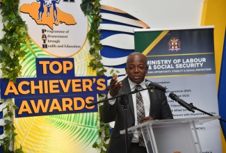 Minister of Labour and Social Security, Hon. Pearnel Charles Jr., delivers the keynote address at the Programme of Advancement through Health and Education (PATH) Top Achievers Awards Ceremony, held at the Spanish Court Hotel in New Kingston, on Thursday (April 11). 