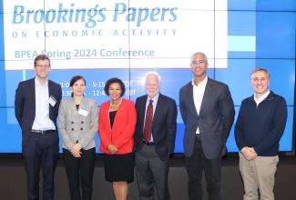 Jamaica’s Ambassador to the United States, Her Excellency Audrey Marks, shares a moment with (from left) Massachusetts Institute of Technology Professor, Emil Vermer; Professor, Harvard Business School, Laura Alfaro; University of Colorado Professor, Barry Eichengreen; Jamaican economist at Stanford University, Professor Peter Blair Henry; and International Monetary Fund (IMF) Economist, Serkan Arslanalp. Occasion was the Brookings Institute spring papers on economic activity, featuring Jamaica, in Washington DC on March 28. 