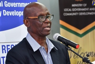 Minister of Local Government and Community Development, Hon. Desmond McKenzie.