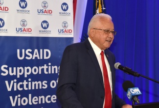 Minister of Justice, Hon. Delroy Chuck, delivers remarks during Wednesday’s (April 10) launch of the United States Agency for International Development (USAID) Supporting Victims of Violence (SVOV) Activity, held at The Jamaica Pegasus Hotel in New Kingston.