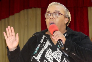 Substance Abuse Counsellor with the National Council on Drug Abuse (NCDA), Lyrris Williams, addresses a mental health forum at the Kitson Town Seventh-day Adventist Church in St. Catherine, on April 6.

