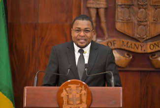 Minister without Portfolio in the Office of the Prime Minister with responsibility for Information, Hon. Robert Morgan, addressing Wednesday’s (April 17) post-Cabinet press briefing at Jamaica House.

