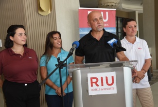 RIU Regional Director, Jamaica, Frank Sondern, addresses the media, following a walkthrough of the new RIU Aquarelle Trelawny Resort, on Thursday April 11, 2024. Others (from left) are Assistant General Manager, Belen Alvarez; Assistant General Manager, Food and Beverage, Carla Santana, and General Manager, Paola Garcia.

