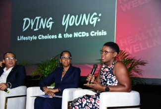 Minister of Health and Wellness, Dr. the Hon. Christopher Tufton (left), and National Epidemiologist, Dr. Karen Webster-Kerr (centre), listen to Kay-Ann Morgan who was among persons interviewed for a documentary titled ‘Dying Young: Lifestyle Choices and the NCD Crisis’, which looks at the impact of non-communicable diseases (NCDs). The 30-minute docu-feature was screened on Wednesday (May 8) at the Courtleigh Auditorium in New Kingston.

