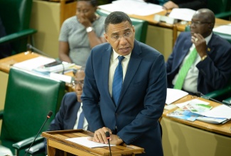 Prime Minister, the Most Hon. Andrew Holness, addresses the House of Representatives on May 21.
