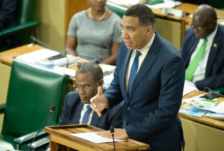 Prime Minister, the Most Hon. Andrew Holness, addresses the House of Representatives on May 21.