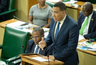 Prime Minister, the Most Hon. Andrew Holness, addresses the House of Representatives on May 21.

