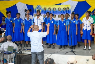 Students from the Jose Marti Technical High School, perform a song at a ceremony held at the institution in St. Catherine on Monday (April 29) where several musical instruments, valued at over $2 million, were handed over to the Visual Arts Department. The instruments were donated by the past students’ association.
