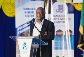 Minister of State in the Ministry of Agriculture, Fisheries and Mining,  Hon. Franklin Witter,  delivers the keynote address at the National Minerals Week Mining/Minerals Conference, at Northern Caribbean University (NCU) in Mandeville, Manchester, on May 6. It was held under the theme ‘Benefits of Minerals Development Activities to Host Communities’.

