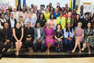 Education and Youth Minister, Hon. Fayval Williams (seated centre), and Ambassador of the United States to
Jamaica, His Excellency N. Nickolas Perry (fourth left), at the American Friends of Jamaica (AFJ) Grant Awards
Ceremony, held on May 7 at the United States Embassy in Kingston. Also pictured are Member of Parliament, St. Ann South
Eastern, Lisa Hanna (third left); Permanent Secretary, Ministry of Education and Youth, Dr. Kasan Troupe (third right) and
members and stakeholders of the AFJ. Each Spring, the AFJ awards its annual discretionary grants. The official
grant awards ceremony is hosted by the standing United States Ambassador to Jamaica and the AFJ Board of Directors,
who present organisations with grants that range from US$500 to US$200,000.