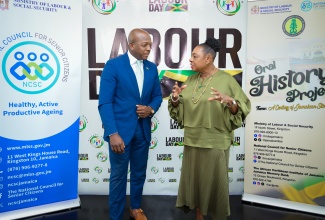 Minister of Culture, Gender, Entertainment and Sport, Hon. Olivia Grange, in discussion with Minister of Labour and Social Security, Hon. Pearnel Charles Jr., during the Oral History Project launch, held recently at the Roof Terrace, Ministry of Culture, Gender, Entertainment and Sport, 4-6 Trafalgar Road in Kingston. The project, to be undertaken by the National Council for Senior Citizens and the African Caribbean Institute of Jamaica/Jamaica Memory Bank, (ACIJ/JMB), will document oral histories of centenarians and older adults with interesting recollections of Jamaica’s history.

