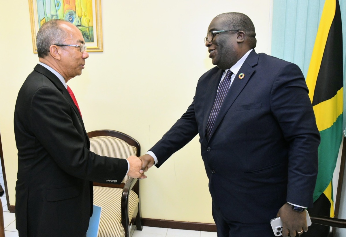 Deputy Prime Minister and Minister of National Security, Hon. Dr. Horace Chang (left), greets Resident Coordinator of the United Nations, Dennis Zulu, during his courtesy call at the Ministry’s offices in New Kingston on Wednesday (May 15).