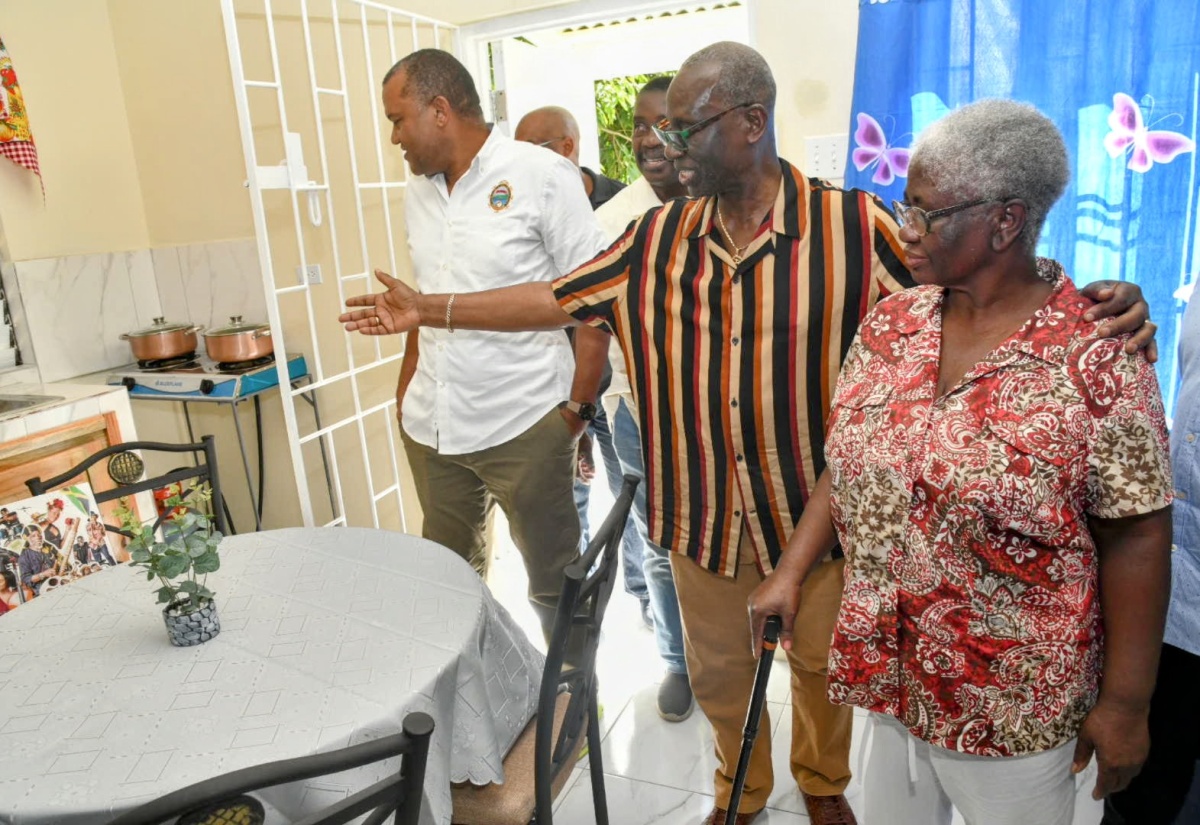 Local Government Minister Hands Over Two Indigent Houses