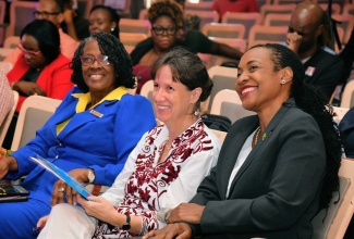 Chair of the National Child Month Committee (NCMC), Dr. Pauline Mullings (left); United Nations Children’s Fund (UNICEF) Country Representative, Olga Isaza (centre), and Minister of State in the Ministry of Education and Youth, Hon Marsha Smith, at the NCMC Child Month 2024 media launch, held on April 25 at the Institute of Jamaica (IOJ), in downtown Kingston and online.

