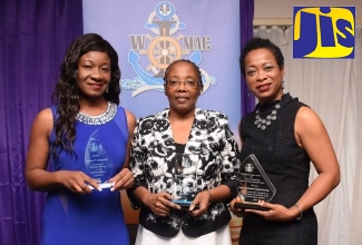 General Manager of Group Operations at Kingston Wharves Limited, Valrie Campbell (left); Deputy Director General of the Maritime Authority of Jamaica, Claudia Grant (centre); and Chief of Defence Staff, Vice Admiral Antonette Wemyss Gorman at a 2019 Women in Maritime Association Caribbean (WiMAC) function.