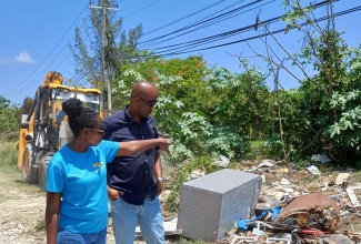 MONTEGO BAY, May 19 (JIS):

WPM Waste Management Limited has commenced work to discontinue the use of several areas across Hanover for garbage disposal.

Among these is a dumpsite in Haughton Meadows, Lucea, where the entity conducted pre-Labour Day activities, including clearing the location of debris.

WPM Waste Management Limited’s Customer Relations Officer, Sharnon Williams, told JIS News that meetings were held with representatives of the Hanover Municipal Corporation and residents to discuss the matter prior to the cleanup.

“We [told] the residents… that the receptacle on the main road [was] not being utilised properly… did not look good… [and was] a haven for rodent infestation; and being that this [area] is [a part] of the main thoroughfare leading into Negril, it doesn’t look good for tourism either,” she stated.

Ms. Williams said the agency distributed some 50 drums for garbage disposal to residents in the area as part of WPM’s ‘Drum A Di Gate’ Programme. She further advised that WPM collects waste from the community weekly.

On Labour Day, Thursday, May 23, the site in Haughton Meadows will be beautified and a ‘no dumping’ sign erected.

Ms. Williams added that WPM Waste Management’s enforcement team will be monitoring the area frequently to ensure no dumping takes place.

She further informed that a dumpsite in the community of Brissett will also be cleared and declared off-limits for garbage disposal.

Meanwhile, WPM Regional Operations Manager, Edward Muir, indicated that several other sites have been identified for clean-up and discontinued use.

(more)

WPM Moves…2

He also advised that the entity is making the necessary arrangements for regular garbage collection in those areas, “so that, by removing the skips [now being used in those locations], we don’t leave gaps [with] persons [having] nowhere to put their garbage.”

For her part, Member of Parliament (MP) for Hanover Western, Tamika Davis, welcomes the eradication of the dumpsite in Haughton Meadows, noting that it was of grave concern to the residents.

“Anyone who travels through Lucea knows that just beside the courthouse, in front of [Haughton Meadows] is a big skip, a dumping area used by almost everyone passing [by]. So the residents have expressed concern, because they have been saying that they are not the ones creating this unsightly mess,” Ms. Davis stated.

The MP added that a bus stop will be constructed at the location after the completion of beautification works.

Meanwhile, resident of Haughton Meadows, Osmond McFarlane, said the cleanup of the site is “the right thing [to do]” as it was becoming a serious health hazard.

Tour bus driver, Oshane Bingham, who traverses the area frequently, welcomes the cleanup, stating that the establishment of a bus stop should serve to prevent any further dumping at the site. 