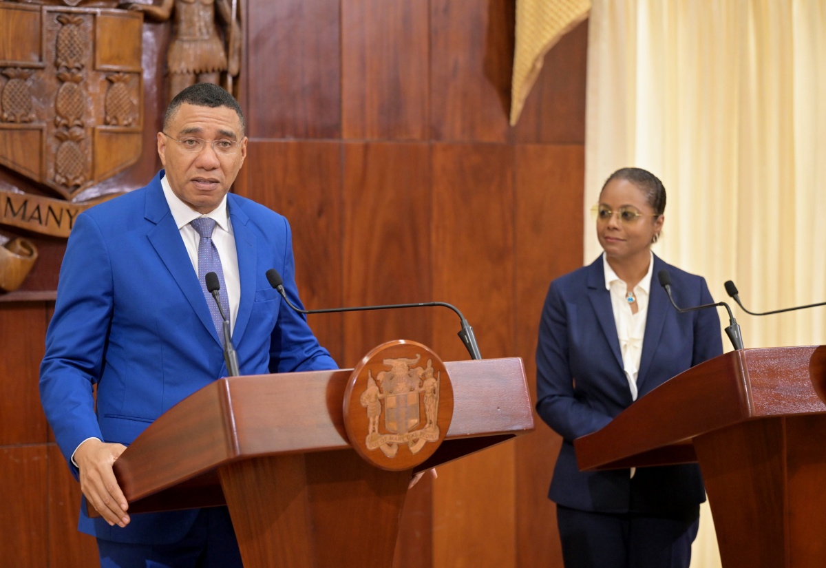 Prime Minister, the Most Hon. Andrew Holness, addresses Wednesday’s (May 15) post-Cabinet press briefing at Jamaica House. Listening is Minister of Legal and Constitutional Affairs, Hon. Marlene Malahoo Forte. 