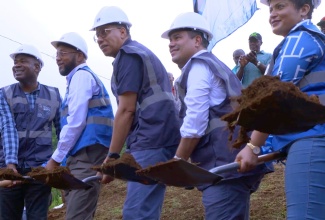 Prime Minister, the Most Hon. Andrew Holness (third left), breaks ground for the Brown's Town to Retreat Pipeline Project in St. Ann, on June 21. Also taking part are (from left) Minister of State in the Ministry of Finance and the Public Service and Member of Parliament for St. Ann South Western, Hon. Zavia Mayne; Mayor of St. Ann's Bay, Councillor Michael Belnavis; Minister without Portfolio in the Ministry of Economic Growth and Job Creation, Senator the Hon. Matthew Samuda and Member of Parliament for St. Ann North Western, Krystal Lee. 

