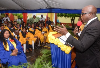 Minister of Labour and Social Security, Hon. Pearnel Charles Jr., addresses the Abilities Foundation graduation ceremony held on the grounds of the institution in Kingston on Thursday (June 27). Approximately 41 students with disabilities successfully completed their studies and were awarded certificates in areas such as Carpentry, Beauty Services, Design and Décor, Data Operation and Housekeeping.

