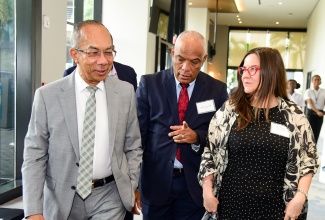 Deputy Prime Minister and Minister of National Security, Hon. Dr. Horace Chang (left), engages with Director General, Major Organised Crime and Anti-Corruption Agency (MOCA),  Col (Ret’d) Desmond Edwards and Chargé d'Affaires at the United States Embassy in Kingston, Amy Tachco, at the Overseas Security Advisory Council Aviation Security Conference, at the AC Marriot Hotel in St. Andrew, on June 17.

