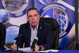Science, Energy, Telecommunications and Transport Minister, Hon. Daryl Vaz, addresses a press conference at the Petroleum Corporation of Jamaica (PCJ) building in Kingston on Tuesday (June 18).

